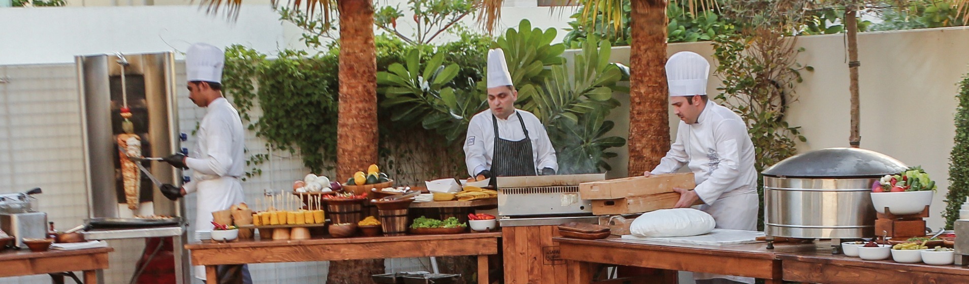 cooks are preparing food in the yard